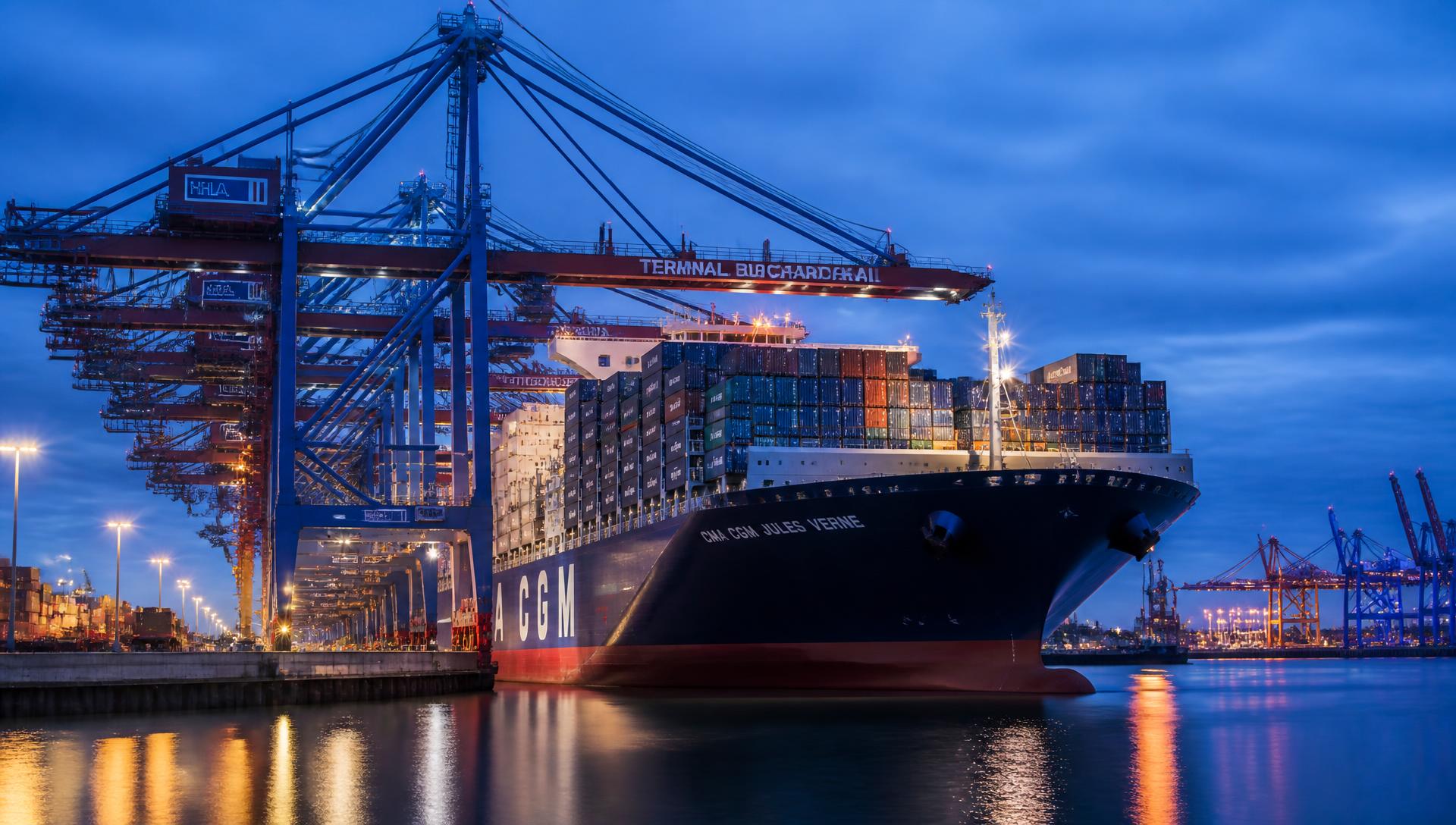 Container vessel loading at an international port terminal